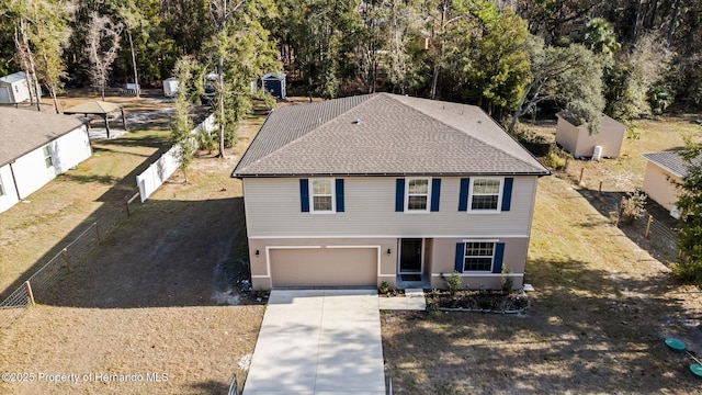 view of front of property featuring a garage