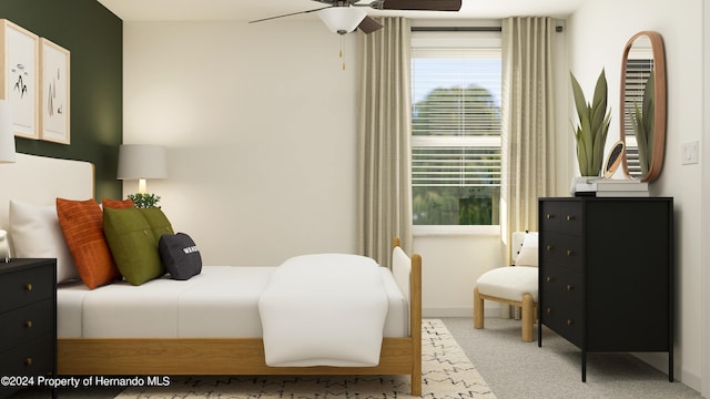 carpeted bedroom featuring ceiling fan