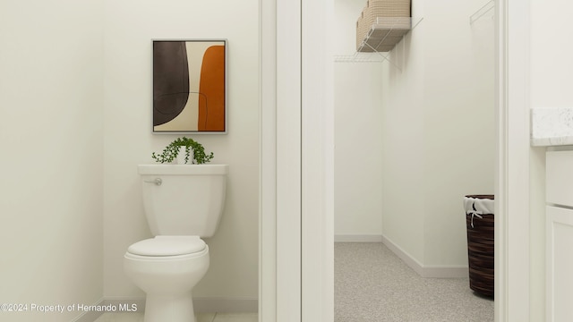 bathroom featuring toilet