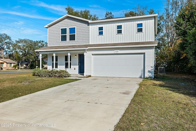 view of front property featuring a garage, a front yard, covered porch, and cooling unit