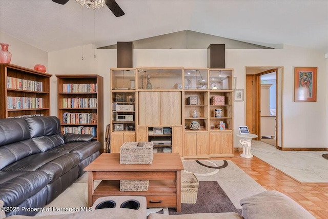 living room with light parquet flooring, vaulted ceiling, and ceiling fan