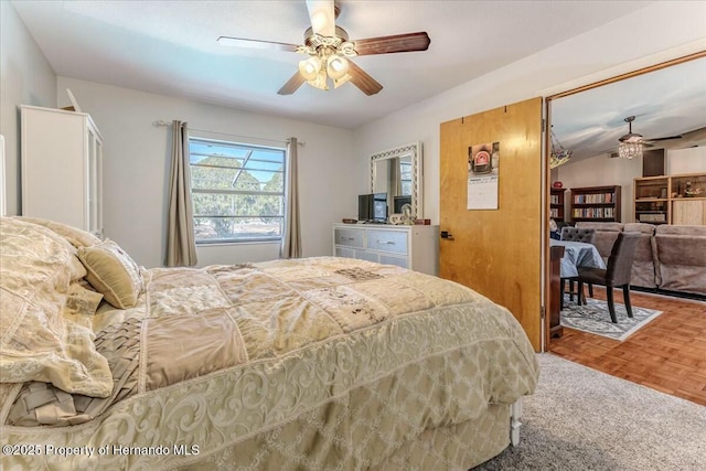 bedroom with parquet flooring and ceiling fan