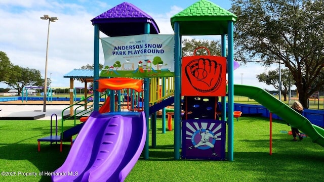 view of play area featuring a yard