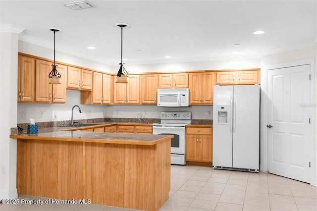 kitchen featuring pendant lighting, sink, white appliances, light tile patterned flooring, and kitchen peninsula