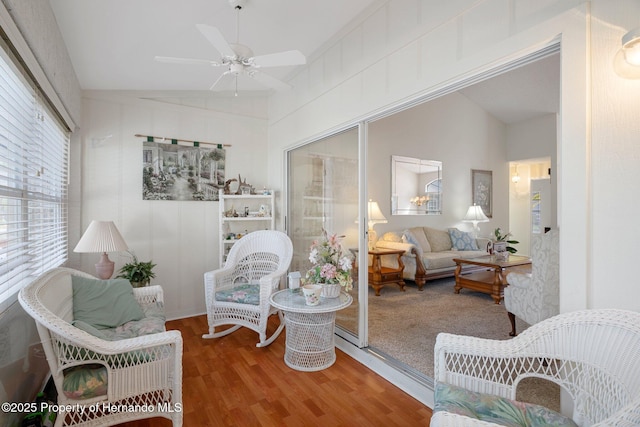 sunroom / solarium with vaulted ceiling and ceiling fan