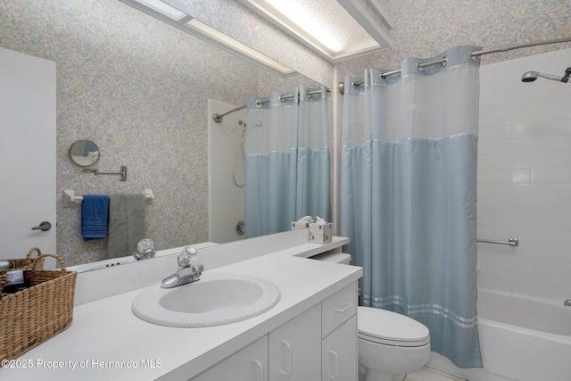 full bathroom featuring vanity, toilet, and shower / bath combo with shower curtain