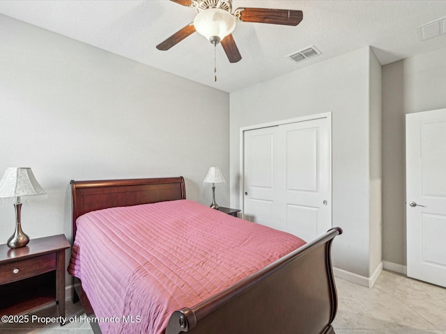 bedroom featuring a closet and ceiling fan