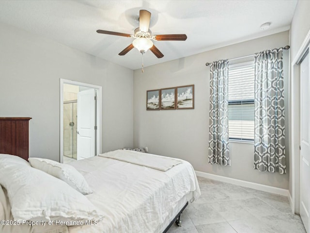 bedroom featuring connected bathroom and ceiling fan