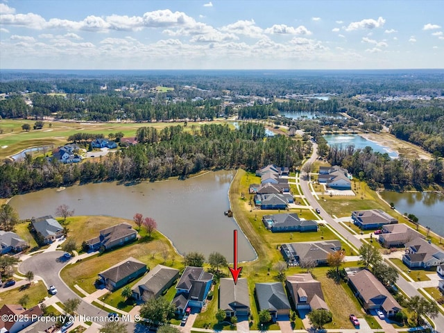 drone / aerial view with a water view