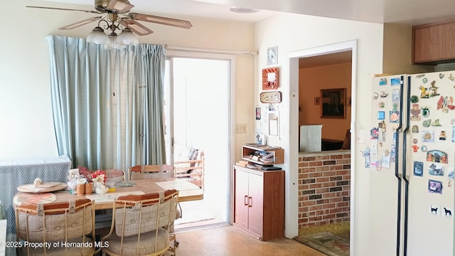 dining room featuring ceiling fan