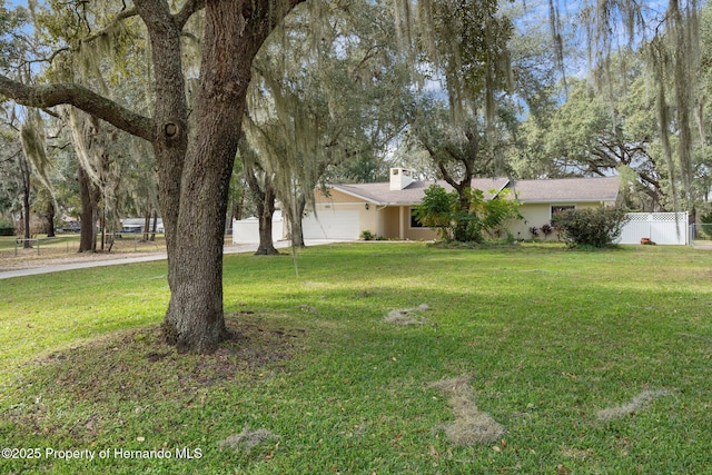 view of yard with a garage