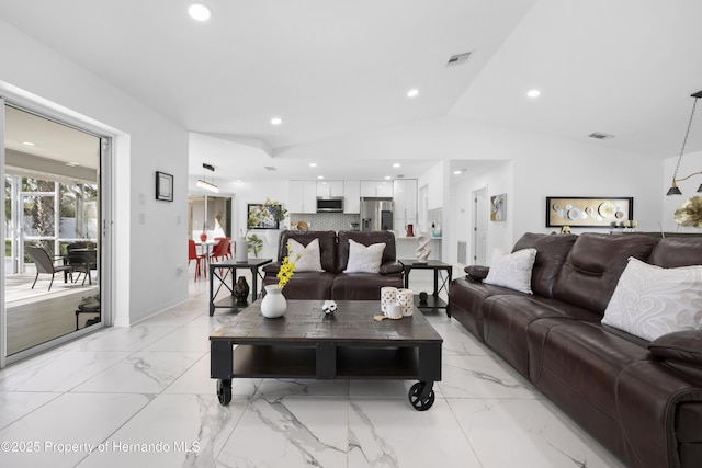 living room with vaulted ceiling