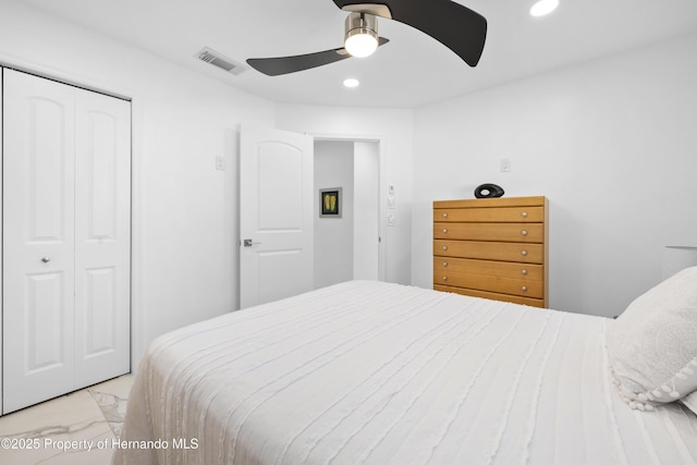 bedroom featuring a closet and ceiling fan