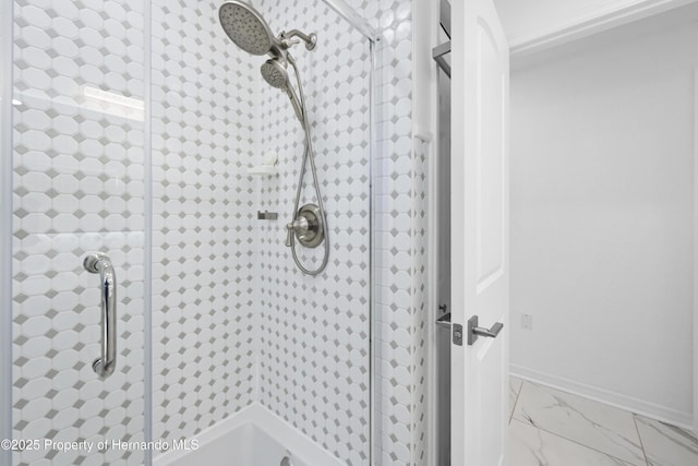 bathroom with a tile shower