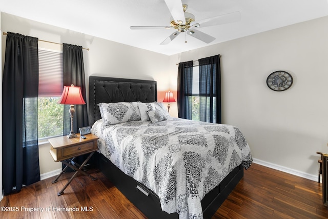 bedroom featuring dark wood-type flooring and ceiling fan