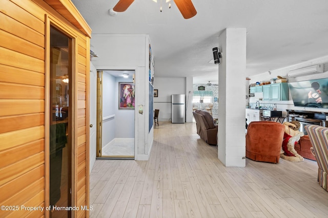 hall featuring light wood-type flooring