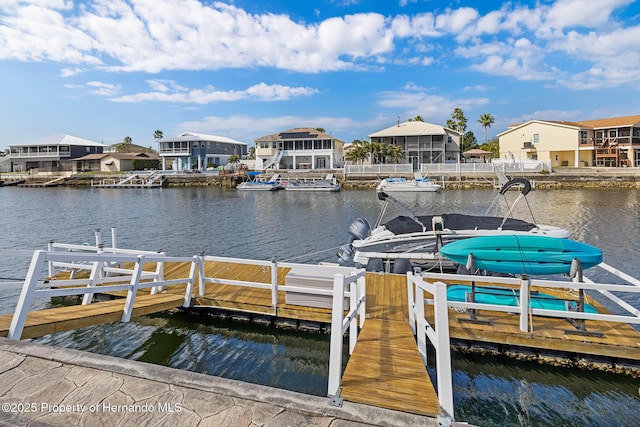 view of dock with a water view