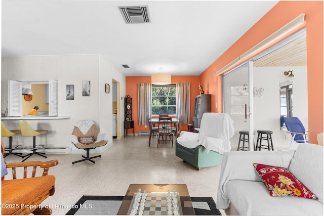 living room with a baseboard radiator