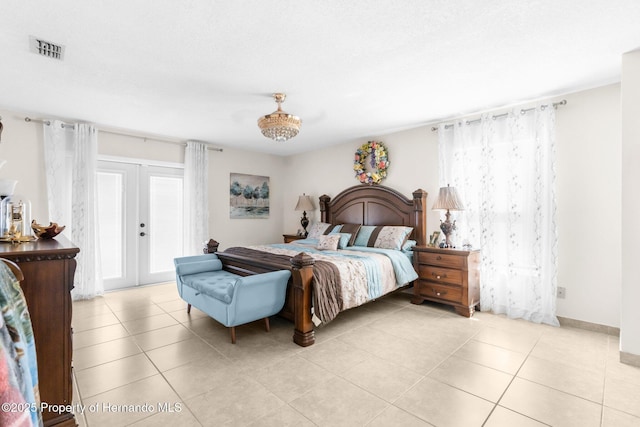 tiled bedroom featuring access to exterior