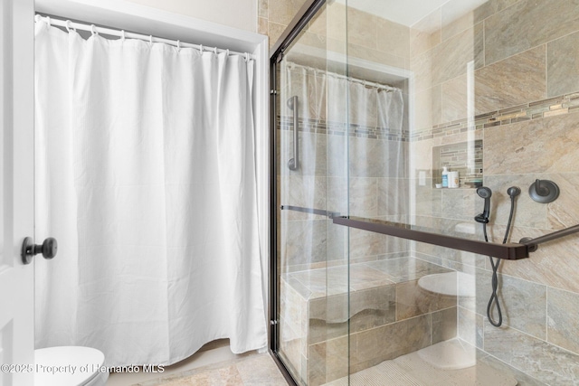 bathroom featuring walk in shower