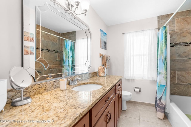 full bathroom with shower / tub combo with curtain, vanity, toilet, and tile patterned flooring