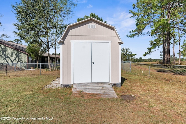 view of outdoor structure featuring a yard