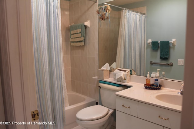 15033 Middle Fairway Dr, Spring Hill, FL 34609 - full bathroom featuring vanity, toilet, and shower / bath combo with shower curtain