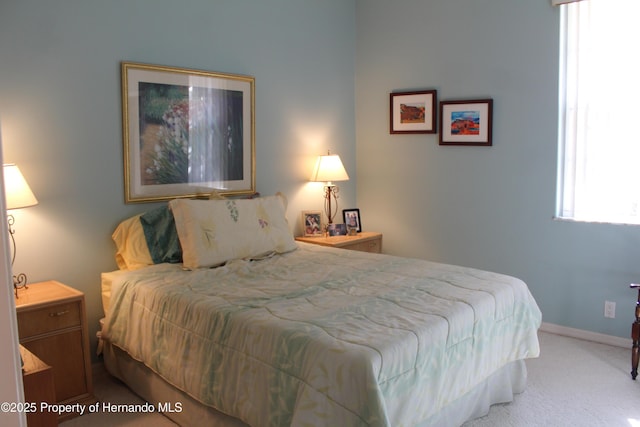 15033 Middle Fairway Dr, Spring Hill, FL 34609 - bedroom with light colored carpet
