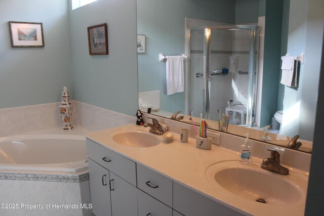 15033 Middle Fairway Dr, Spring Hill, FL 34609 - full bathroom featuring toilet, vanity, and shower with separate bathtub
