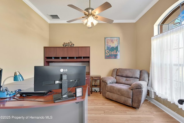 office with crown molding, ceiling fan, and light hardwood / wood-style flooring