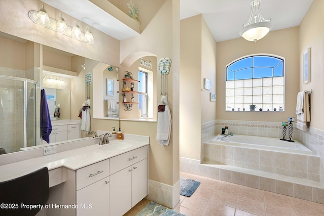 bathroom featuring vanity, tile patterned floors, and independent shower and bath