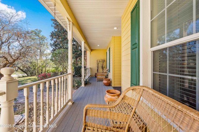 wooden terrace featuring a porch