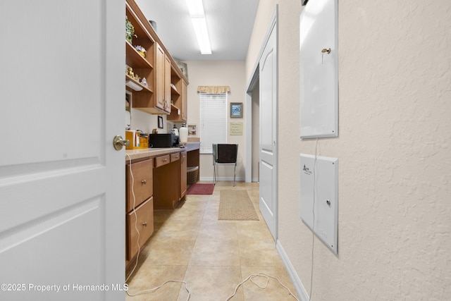 5685 W Pine Ridge Blvd, Beverly Hills, FL 34465 - kitchen with light tile patterned flooring
