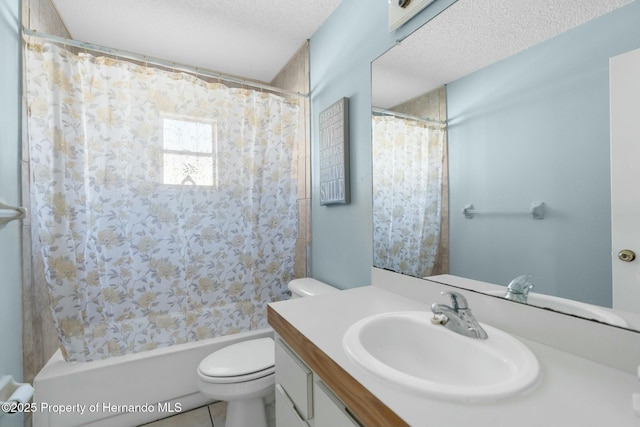 full bathroom featuring vanity, shower / bath combination with curtain, a textured ceiling, and toilet