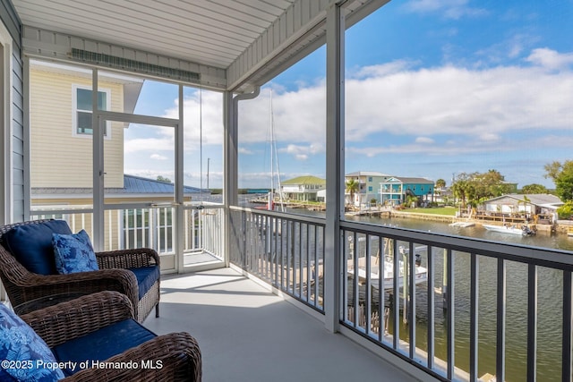 balcony featuring a water view