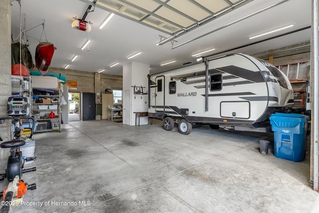 garage featuring a garage door opener