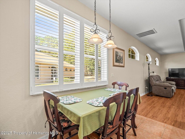 dining area featuring tile patterned floors