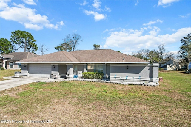 single story home featuring a garage and a front lawn