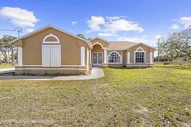 view of front of home with a front yard