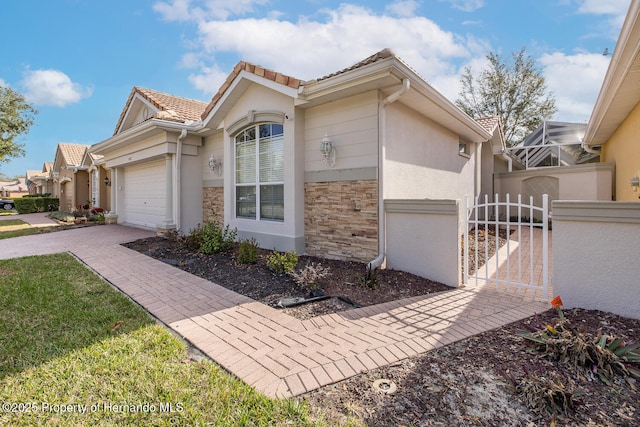 view of front of home featuring a garage