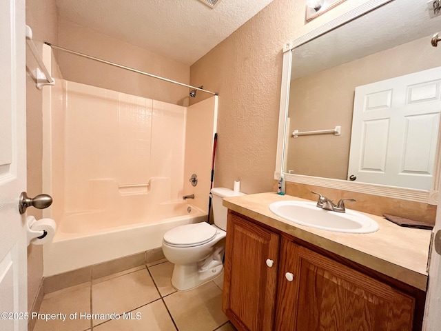 bathroom featuring a textured ceiling, shower / tub combination, tile patterned flooring, toilet, and vanity