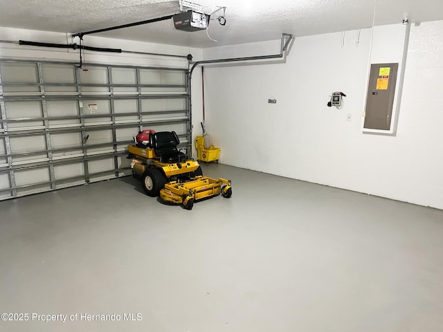 garage featuring electric panel and a garage door opener