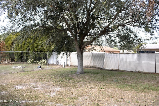 view of yard with a fenced backyard