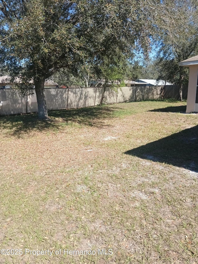 view of yard featuring a fenced backyard