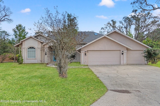 single story home with a front lawn and a garage