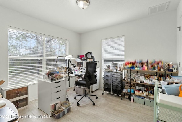 home office featuring light wood-type flooring