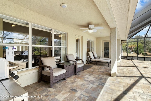 view of patio with ceiling fan