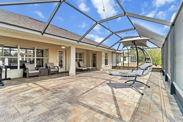 view of patio with a lanai and outdoor lounge area