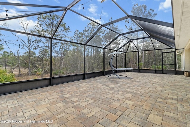 view of patio / terrace with glass enclosure