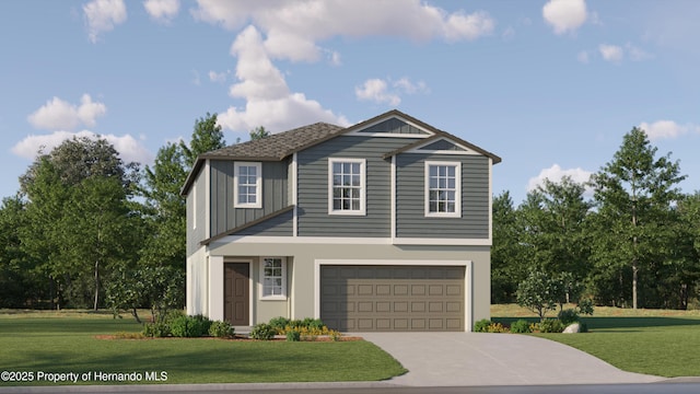 view of front of home featuring a front lawn and a garage